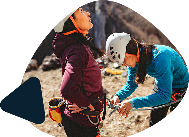 Climbers clipping on